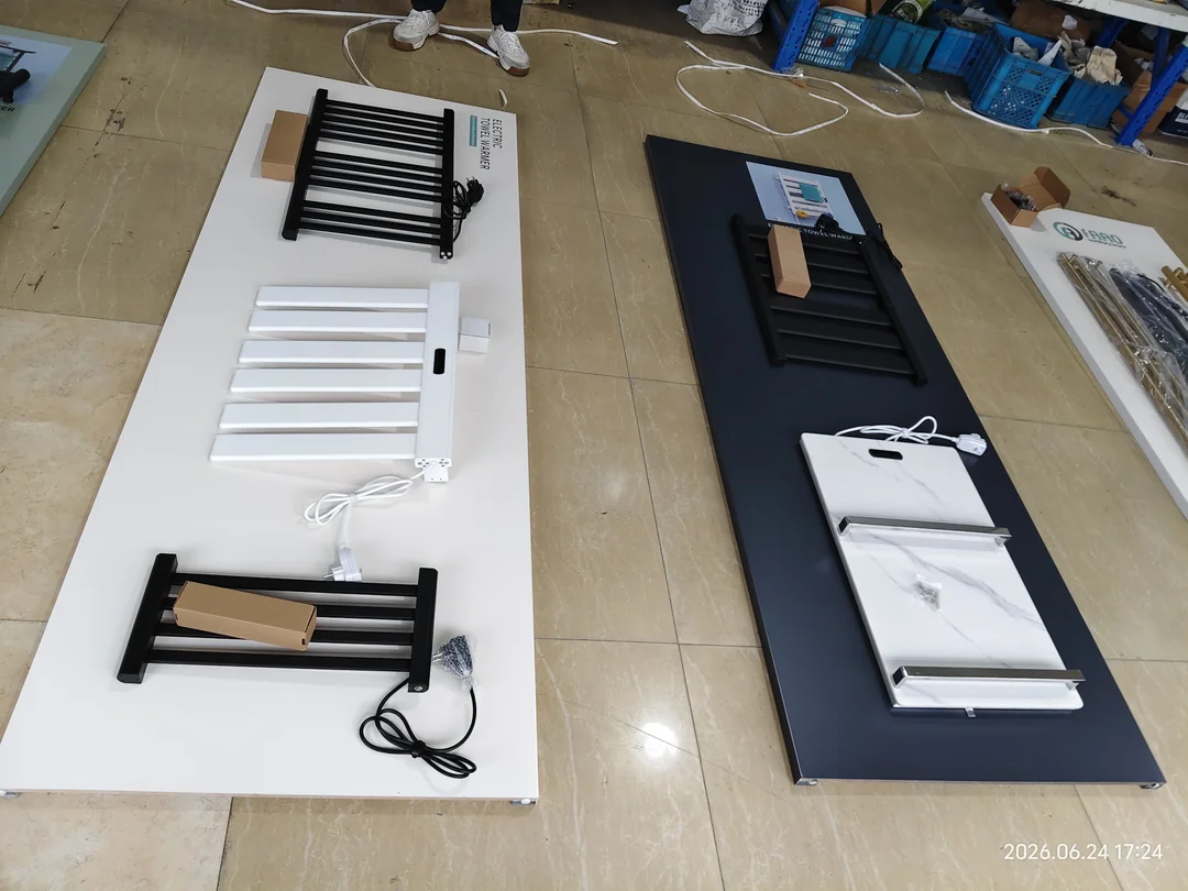FAAO electric towel warmer models on display at the factory before bulk shipment